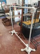 * white tubular with cast iron base clothes rail