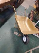 * gold wheelbarrow