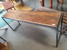 * mid-level industrial metal frame display table with rustic wooden top 1400w x 350d x 620h