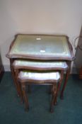 Nest of Three Tables with Glass Tops and Tooled Le