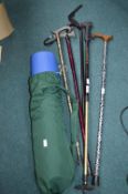 Walking Sticks, Poles, and a Yoga Mat