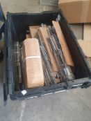 * box containing assorted window hinges