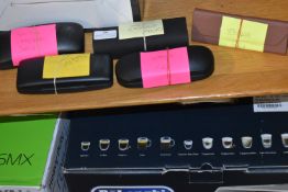 *Five Pairs of Glasses (three without lenses)