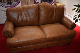 *Tan Leather Two Seat Settee