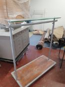 * clothes hanging rail on castors wth glass top shelf 1500w