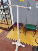 * white tubular with cast iron base clothes rail