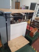 * cast clothing rail with scafolding board shelves