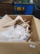 * box of wooden hangers
