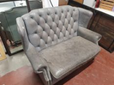 * Grey leather sofa