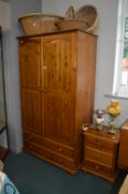Pine Effect Wardrobe and a Three Drawer Bedside Ca
