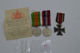 Reproduction German Iron Cross plus WWII Defence M