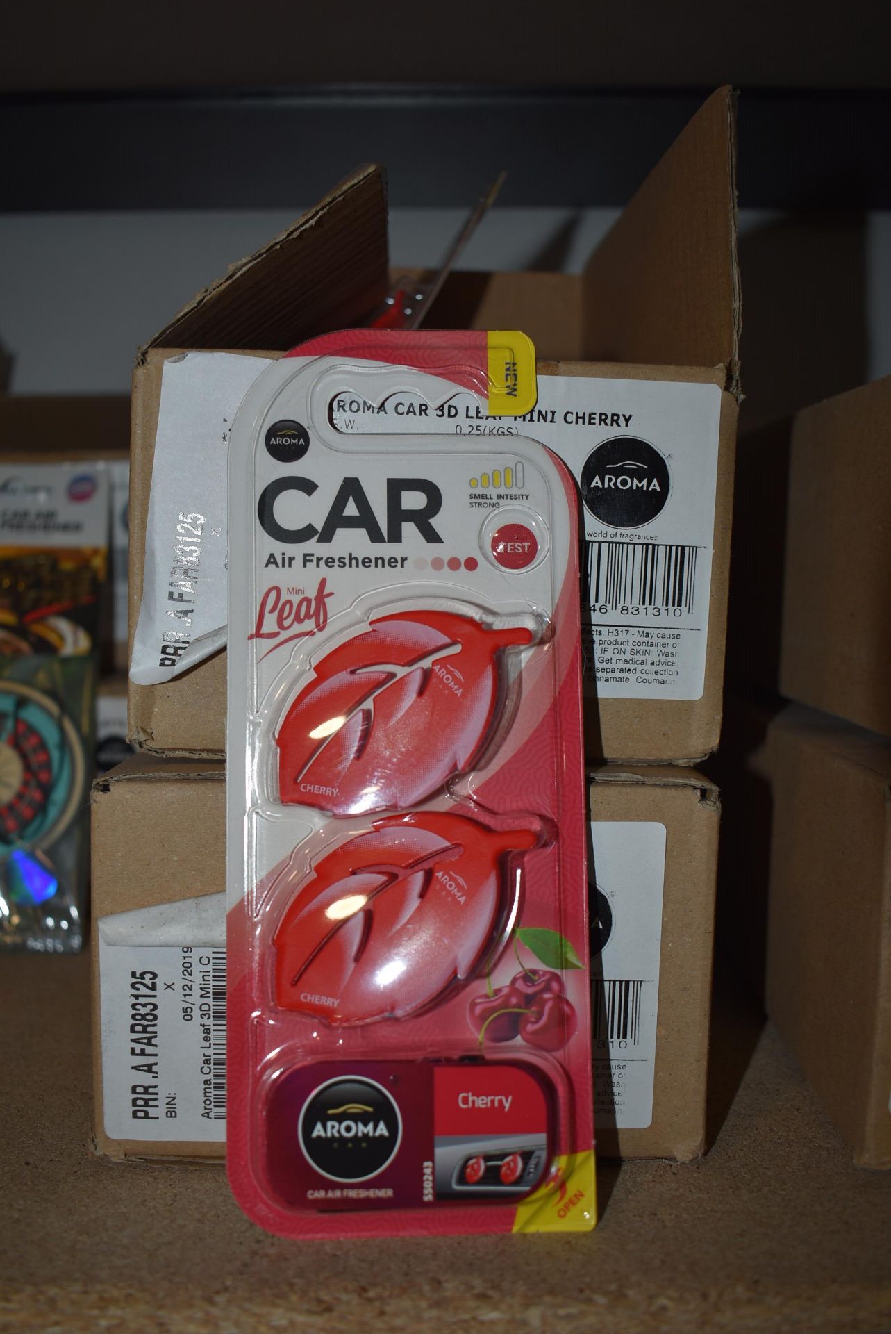 Four Boxes of 10 Aroma Car 3D Leaf Mini Cherry Air Fresheners (expired)