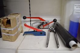 *Strapping Set Including Two Strappers, Roll of Wrap, Metal Clips, and a Strapping Sealer