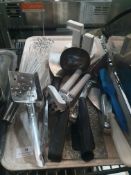 * selection of utentils - including knife sharpener, ticket spike, cake slices, etc