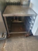 * S/S trolly on castors swith tray shelves