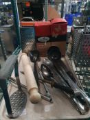 * selection of utentils - graters, straws, spoons, etc