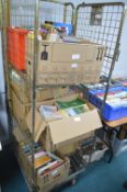 Seven Boxes of Assorted Books (cage not included)
