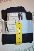*Two Calvin Klein French Terry Ladies Joggers Size: S (one blue, one black)