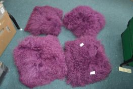 Four Aubergine Cushions