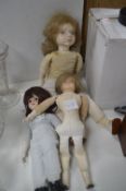Three Porcelain Dolls