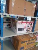 * returned goods - unknown condition - contents of bay. 2 x microwaves/SEBO hoover