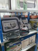 * returned goods - unknown condition - contents of bay. Laundry bin/pans/vaccum/etc