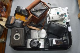 Assorted Cameras Including Canon, Ixus, and Suresh