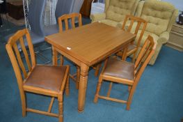 Expanding Dining Table with Vinyl Upholstered Chai