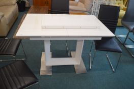 Extending White Dining Table with Four Chrome Fram