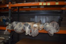 *Eight Assorted Rolls of Fabric