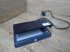 * safe scan UV light note checker