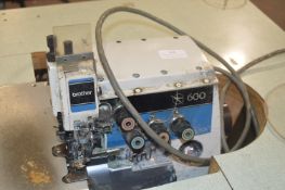 Brother 600 Five Thread Overlocking Pocket Binder on Table with Electric Motor