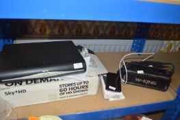 Samsung Mobile Phone, Portable Speaker, and a Sky