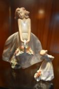 Lladro Figurine of a Girl with Flowers plus Small