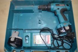 *Makita Drill with Two Batteries, Charger, and Cas