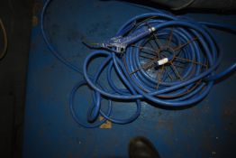 *Reel of Blue Air Hose with Gun