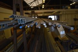 *Contents of Shelf to Include Assorted Round Bar