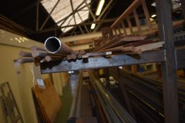 *Contents of Shelf to Include Assorted Round Bar