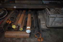 *Contents Under Bench Including Threaded Bar, Pipe, etc.