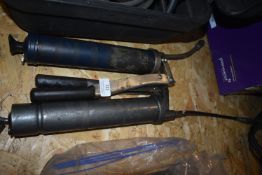*Two Grease Guns