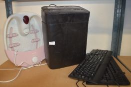 *Paper Shredder, Keyboard, and a Foot Spa