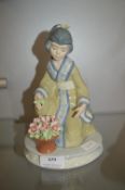 Nadal Figurine of a Oriental Girl (damage to base)