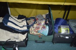Three Travel Cases Containing Sleeping Bags, Cloth
