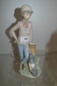 Lladro Nao Figure of a Boy and His Dog