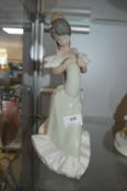 Lladro Nao Figure of a Girl with a Rose