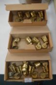 Fourteen Brass Furniture Castors