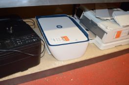 *Two HP and a Canon Printers