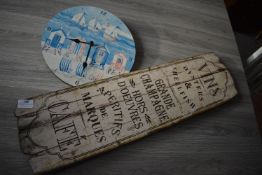 *Café and Other Signs, and a Clock