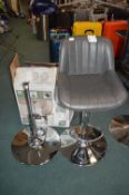 *Two Grey Gas-Lift Barstools