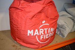 *Three Red Martini Fiero Beanbags, and a Small Grey Duvet and Pillow